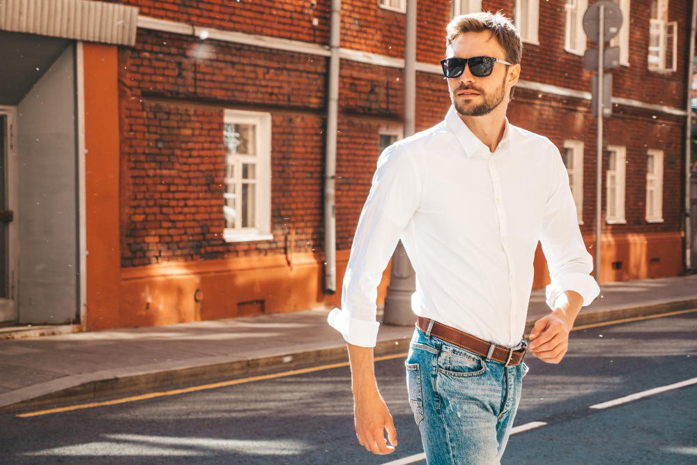 Portrait Handsome Confident Stylish Hipster Lambersexual Modelmodern Man Dressed White Shirt Fashion Male Posing Street Background Sunglasses Outdoors Sunset 